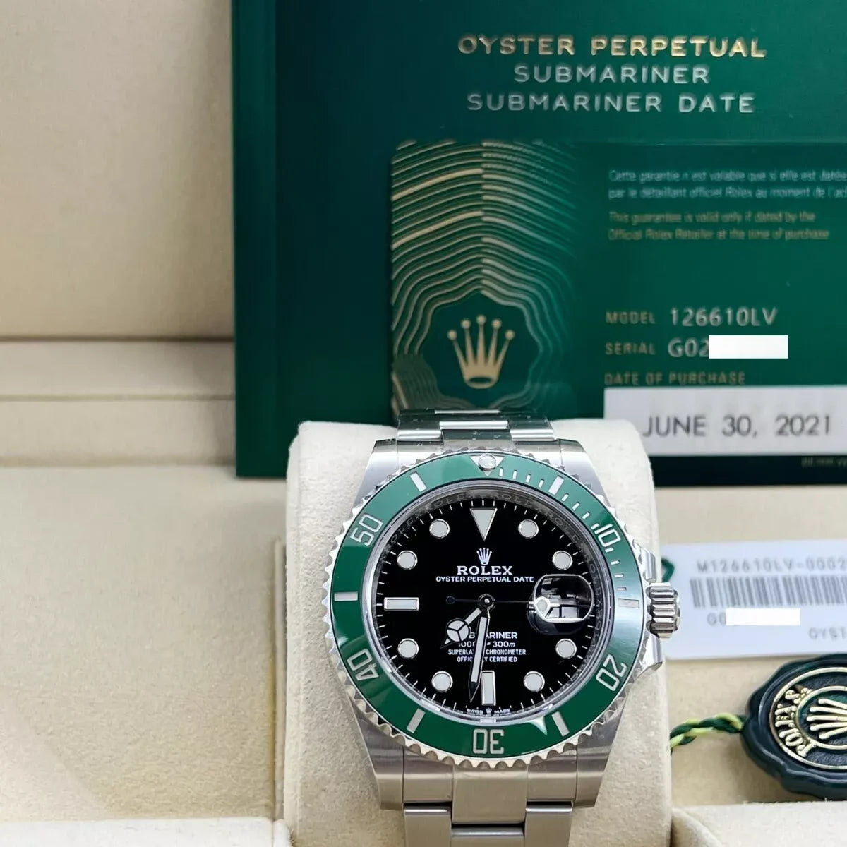The Rolex Submariner Date Silver 41mm, Black Dial - Green Bezel
