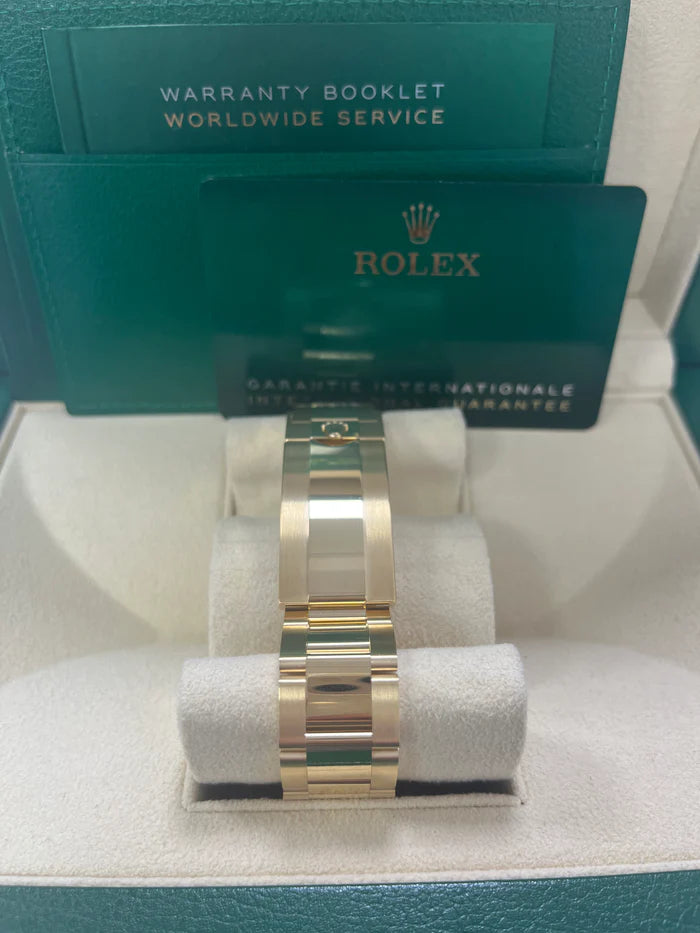 The Rolex Submariner Date Gold 41mm, Black Dial - Black Bezel