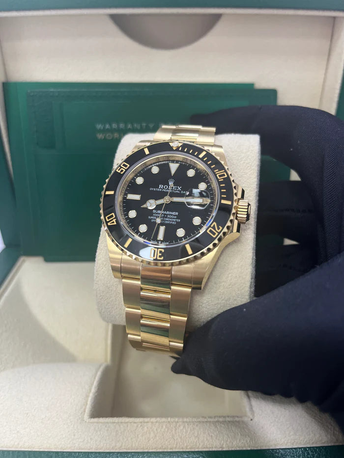 The Rolex Submariner Date Gold 41mm, Black Dial - Black Bezel