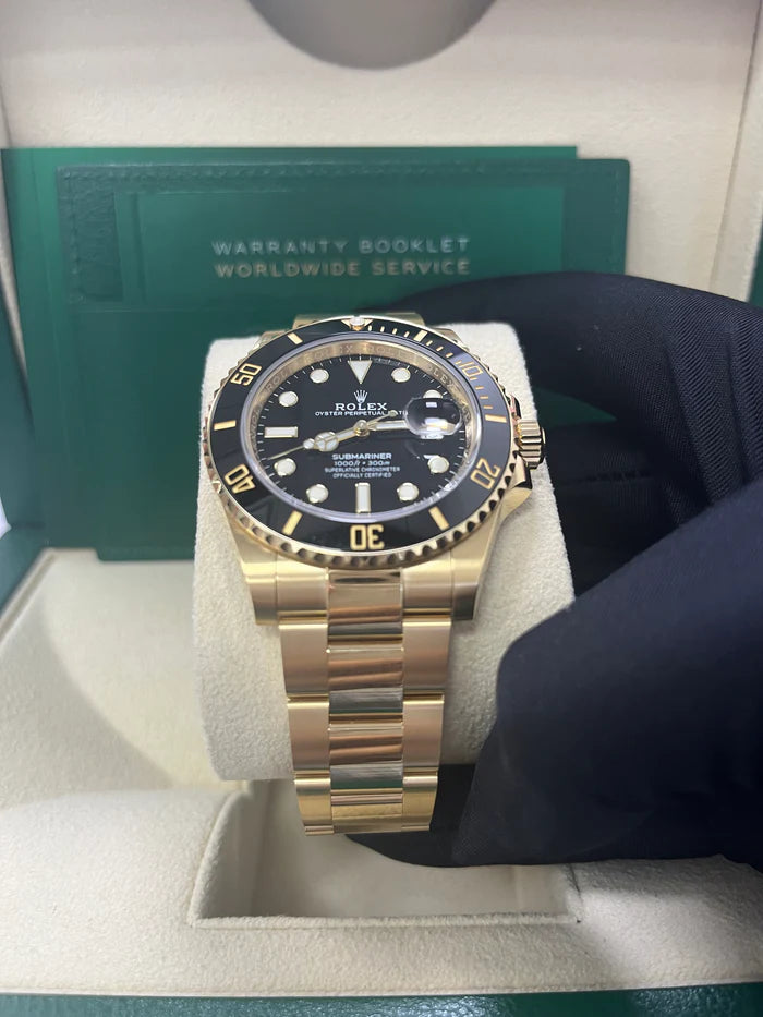 The Rolex Submariner Date Gold 41mm, Black Dial - Black Bezel