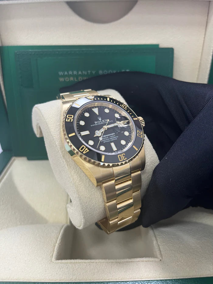 The Rolex Submariner Date Gold 41mm, Black Dial - Black Bezel