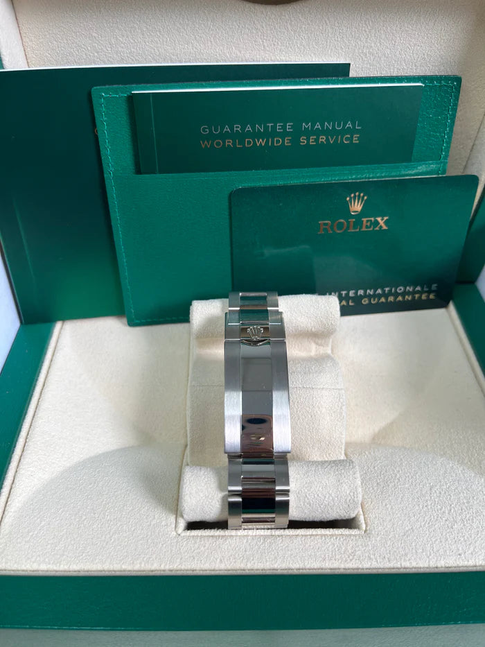 The Rolex Submariner Date Silver 41mm, Black Dial - Blue Bezel