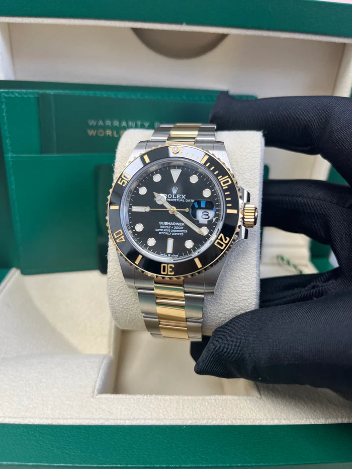 The Rolex Submariner Date Silver and Gold 41mm, Black Dial - Black Bezel