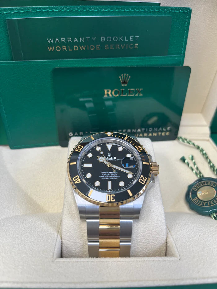 The Rolex Submariner Date Silver and Gold 41mm, Black Dial - Black Bezel