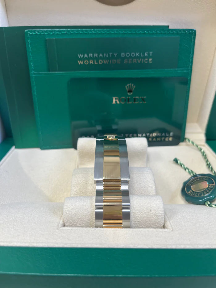 The Rolex Submariner Date Silver and Gold 41mm, Black Dial - Black Bezel