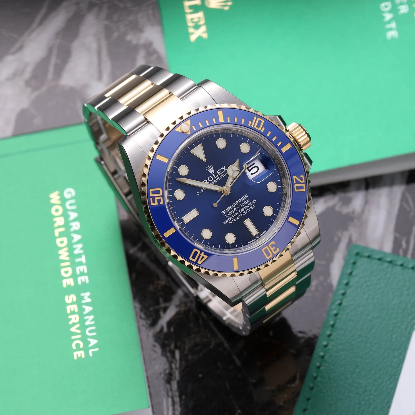The Rolex Submariner Date Silver and Gold 41mm, Blue Dial - Blue Bezel