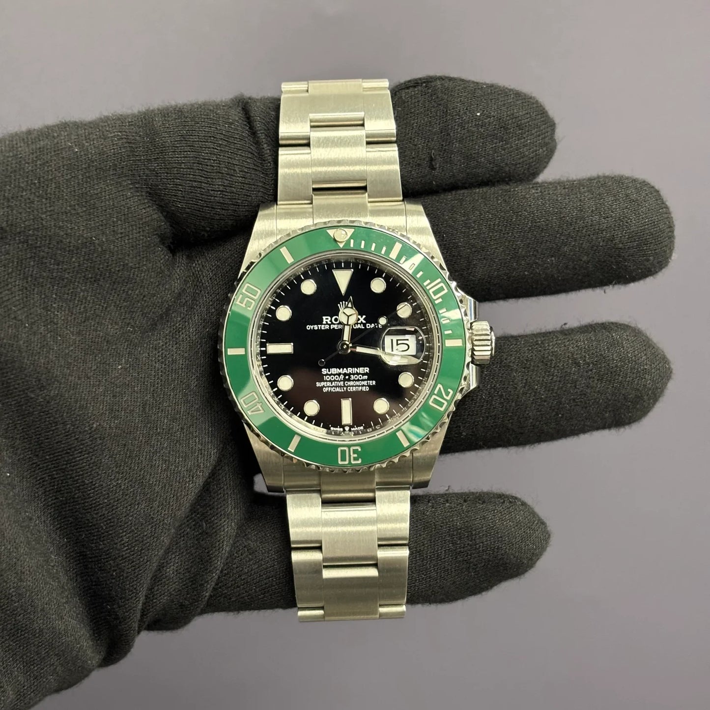 The Rolex Submariner Date Silver 41mm, Black Dial - Green Bezel