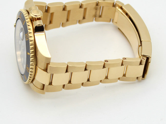 The Rolex Submariner Date Gold 41mm, Black Dial - Black Bezel