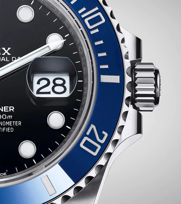 The Rolex Submariner Date Silver 41mm, Black Dial - Blue Bezel