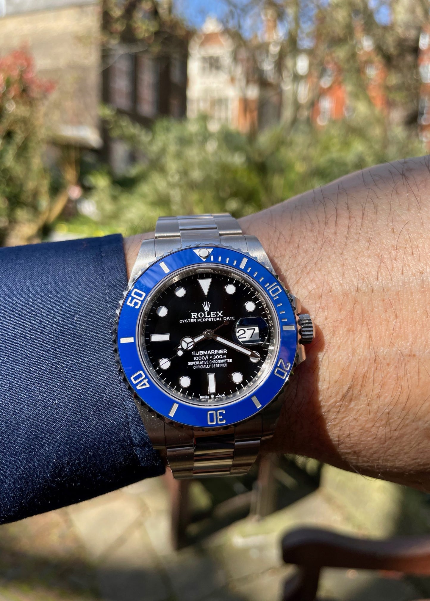 The Rolex Submariner Date Silver 41mm, Black Dial - Blue Bezel