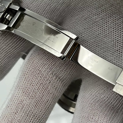 The Rolex Submariner Date Silver 41mm, Black Dial - Green Bezel