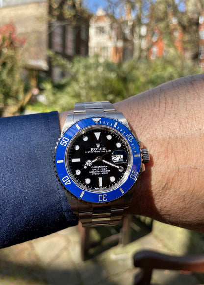 The Rolex Submariner Date Silver 41mm, Black Dial - Blue Bezel