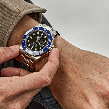 The Rolex Submariner Date Silver 41mm, Black Dial - Blue Bezel